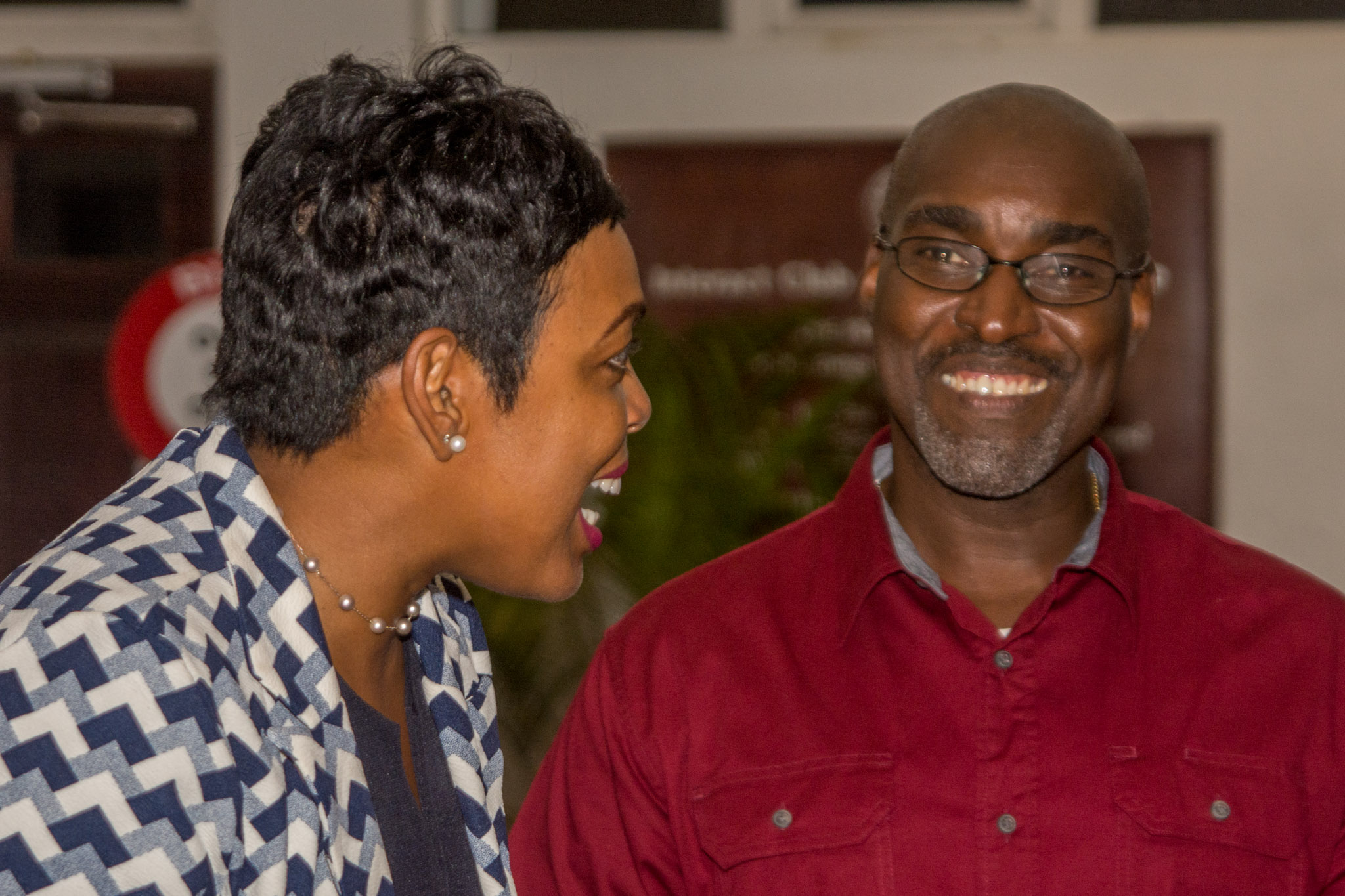 Antonio Rowe from Coastal shares a light moment with MC Shelly Burgess